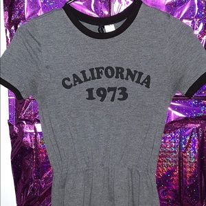 Gray with black trim “California 1973” dress